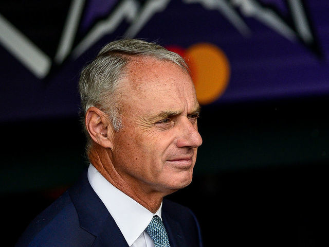 DENVER, CO - JULY 13: Commissioner of Major League Baseball Rob Manfred looks on from the National League dugout prior to the 91st MLB All-Star Game at Coors Field on July 13, 2021 in Denver, Colorado.