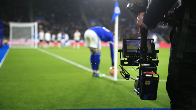 LEICESTER, ENGLAND - JANUARY 19: A television Steadicam cameraman films the action during the Premier League match between Leicester City and Tottenham Hotspur at The King Power Stadium on January 19, 2022 in Leicester, United Kingdom.