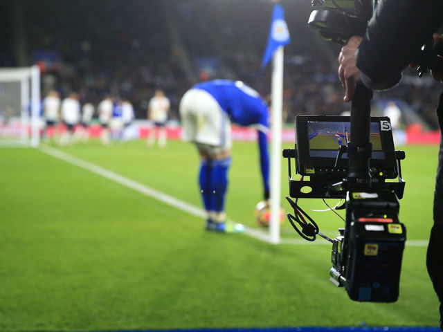 LEICESTER, ENGLAND - JANUARY 19: A television Steadicam cameraman films the action during the Premier League match between Leicester City and Tottenham Hotspur at The King Power Stadium on January 19, 2022 in Leicester, United Kingdom.