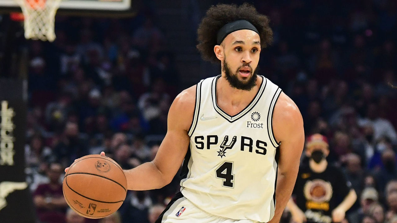 CLEVELAND, OH - FEBRUARY 9: Derrick White #4 of the San Antonio Spurs drives to the basket during the game against the Cleveland Cavaliers on February 9, 2022 at Rocket Mortgage FieldHouse in Cleveland, Ohio. NOTE TO USER: User expressly acknowledges and agrees that, by downloading and/or using this Photograph, user is consenting to the terms and conditions of the Getty Images License Agreement. Mandatory Copyright Notice: Copyright 2022 NBAE