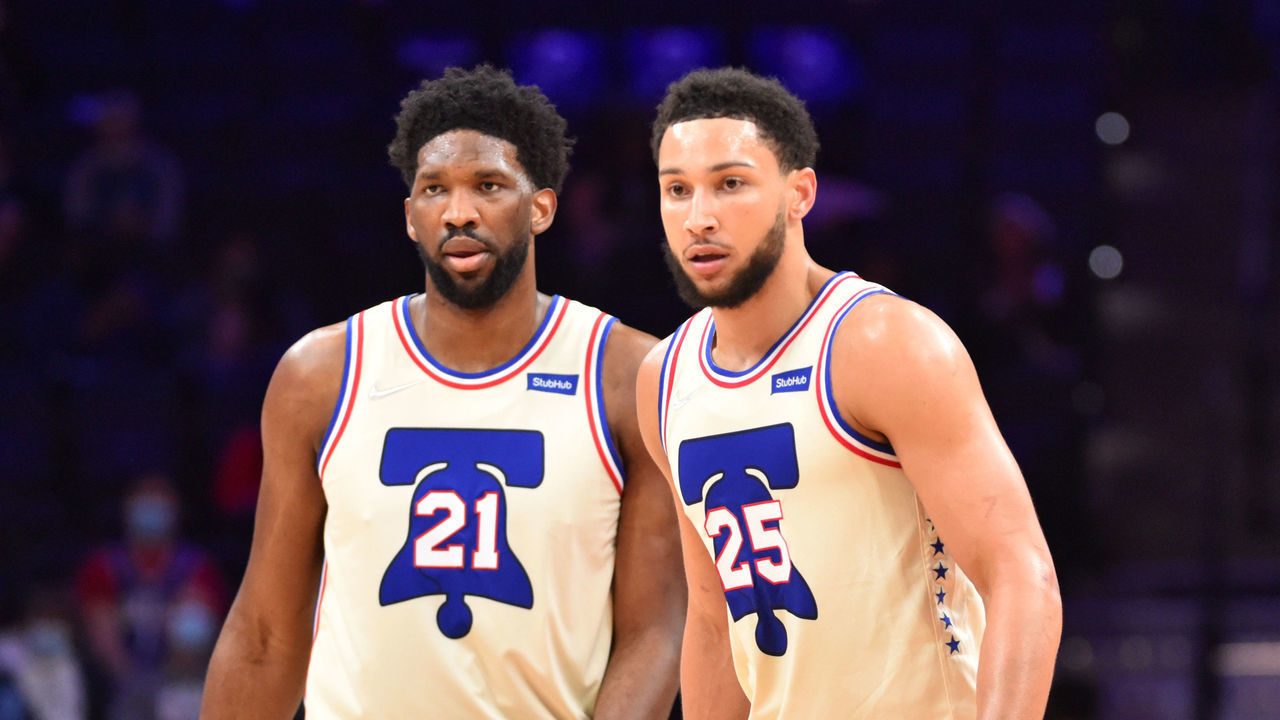 PHILADELPHIA, PA - APRIL 14: Joel Embiid #21 of the Philadelphia 76ers and Ben Simmons #25 of the Philadelphia 76ers look on during a game against the Brooklyn Nets on April 14, 2021 at Wells Fargo Center in Philadelphia, Pennsylvania. NOTE TO USER: User expressly acknowledges and agrees that, by downloading and/or using this Photograph, user is consenting to the terms and conditions of the Getty Images License Agreement. Mandatory Copyright Notice: Copyright 2021 NBAE