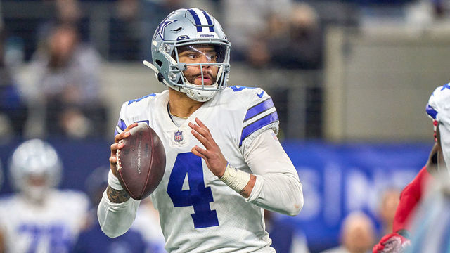 ARLINGTON, TX - JANUARY 16: Dallas Cowboys quarterback Dak Prescott (4) throws the football during the NFC Wild Card game between the San Francisco 49ers and the Dallas Cowboys on January 16, 2022 at AT&T Stadium in Arlington, TX.