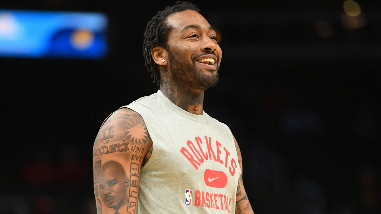 ATLANTA, GA - DECEMBER 13: John Wall #1 of the Houston Rockets smiles before the game against the Atlanta Hawks on December 13, 2021 at State Farm Arena in Atlanta, Georgia. NOTE TO USER: User expressly acknowledges and agrees that, by downloading and/or using this Photograph, user is consenting to the terms and conditions of the Getty Images License Agreement. Mandatory Copyright Notice: Copyright 2021 NBAE