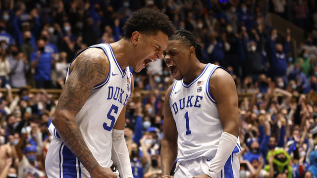 DURHAM, NORTH CAROLINA - JANUARY 08: Paolo Banchero #5 and Trevor Keels #1 of the Duke Blue Devils react after Banchero's dunk against the Miami Hurricanes during their game at Cameron Indoor Stadium on January 08, 2022 in Durham, North Carolina. Miami won 76-74.