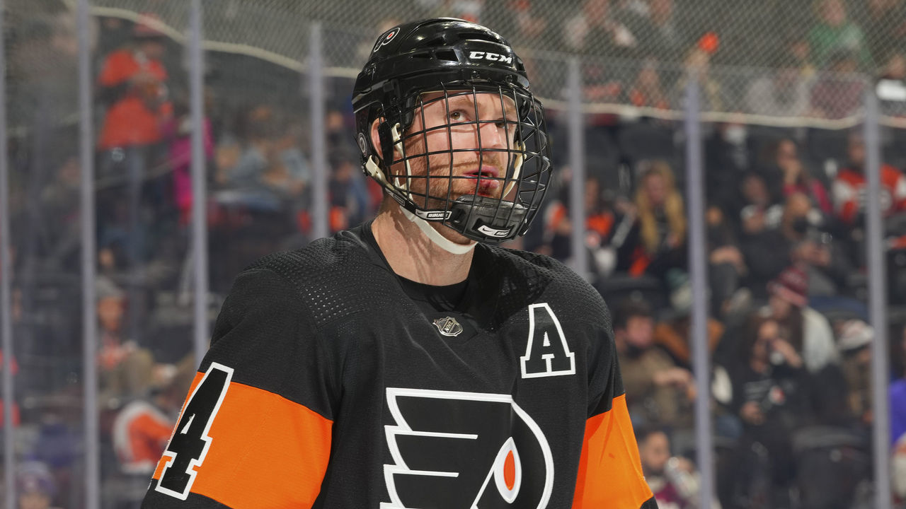 PHILADELPHIA, PA - DECEMBER 05: Sean Couturier #14 of the Philadelphia Flyers looks on against the Tampa Bay Lightning at the Wells Fargo Center on December 5, 2021 in Philadelphia, Pennsylvania. The Tampa Bay Lightning defeated the Philadelphia Flyers 7-1.