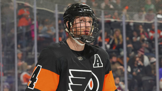 PHILADELPHIA, PA - DECEMBER 05: Sean Couturier #14 of the Philadelphia Flyers looks on against the Tampa Bay Lightning at the Wells Fargo Center on December 5, 2021 in Philadelphia, Pennsylvania. The Tampa Bay Lightning defeated the Philadelphia Flyers 7-1.