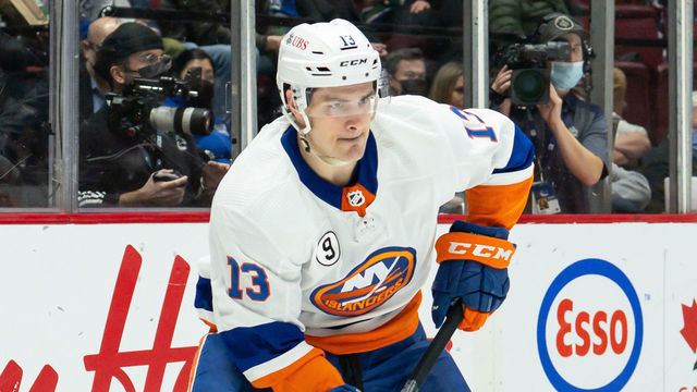 VANCOUVER, BC - FEBRUARY 09: New York Islanders center Mathew Barzal (13) skates with the puck during their NHL game against the Vancouver Canucks at Rogers Arena on February 9, 2022 in Vancouver, British Columbia, Canada.