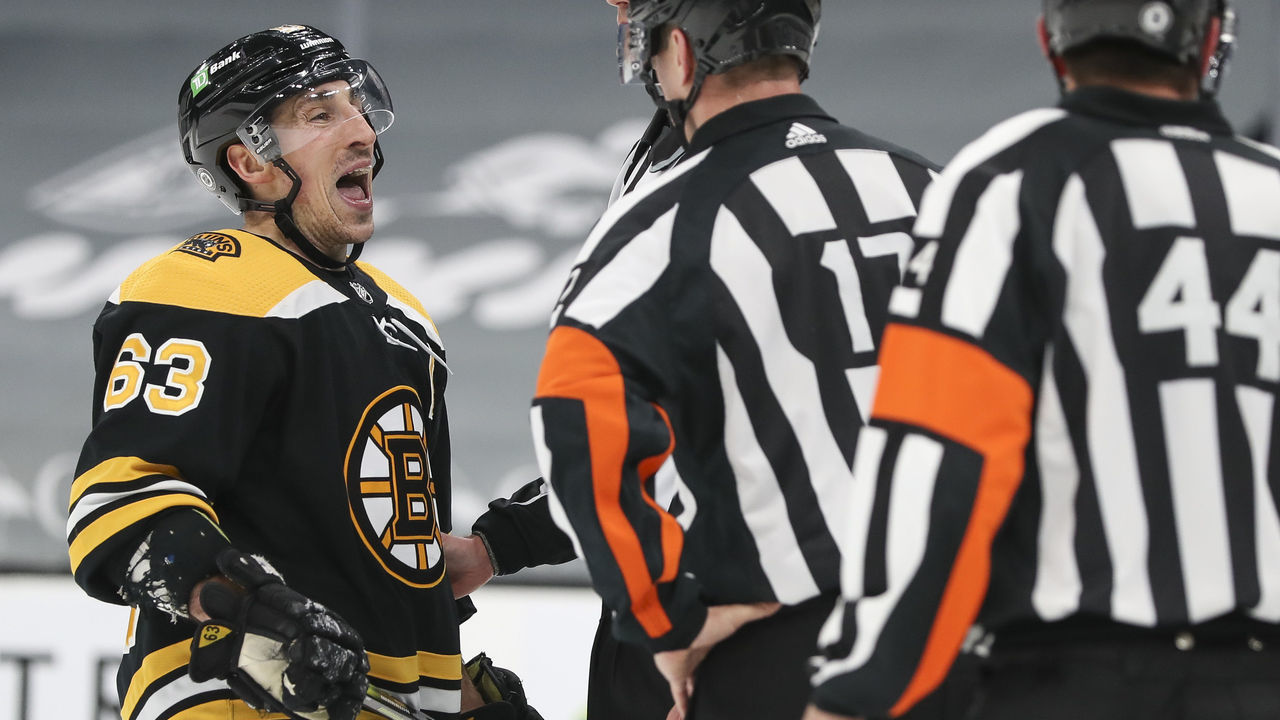 BOSTON, MA - APRIL 13: Brad Marchand #63 of the Boston Bruins argues with the referees in the third period against the Buffalo Sabres at TD Garden on April 13, 2021 in Boston, Massachusetts.