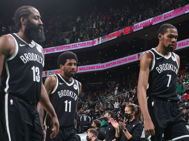BOSTON, MA - MAY 30: James Harden #13, Kyrie Irving #11 and Kevin Durant #7 of the Brooklyn Nets walk off the court at halftime during Round 1, Game 4 of the 2021 NBA Playoffs on May 30, 2021 at the TD Garden in Boston, Massachusetts. Mandatory Copyright Notice: Copyright 2021 NBAE