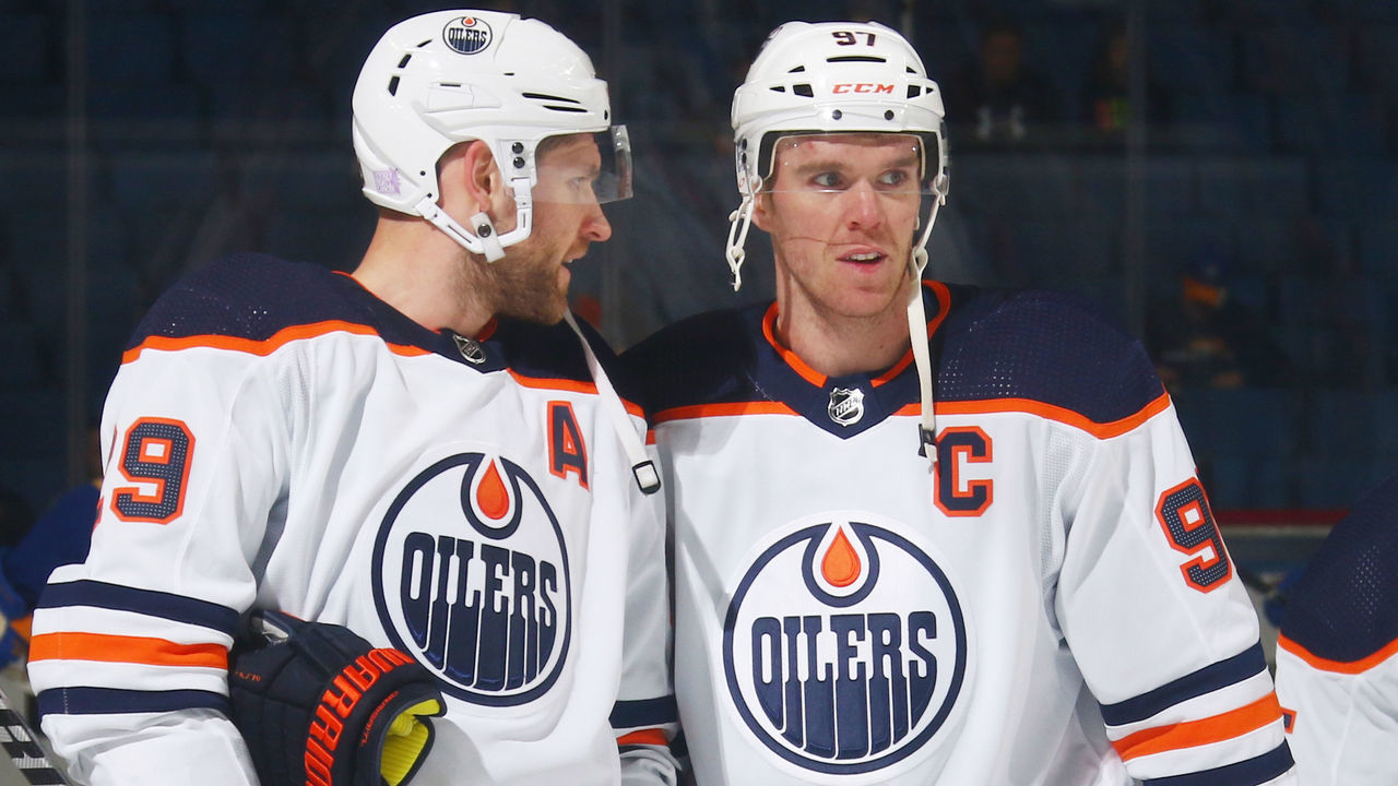 BUFFALO, NY - NOVEMBER 12: Leon Draisaitl #29 and Connor McDavid #97 of the Edmonton Oilers warmup prior to an NHL game against the Buffalo Sabres on November 12, 2021 at KeyBank Center in Buffalo, New York.