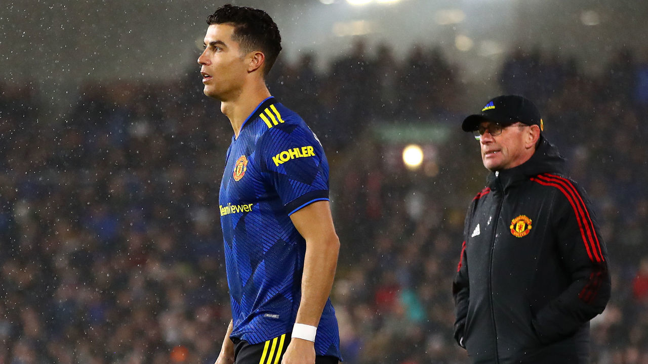 BURNLEY, ENGLAND - FEBRUARY 08: Cristiano Ronaldo of Manchester United prepares to enter the field as manager Ralf Rangnick looks on during the Premier League match between Burnley and Manchester United at Turf Moor on February 08, 2022 in Burnley, England.
