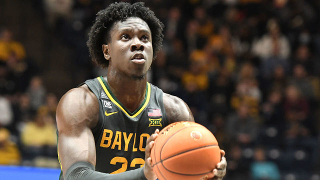 MORGANTOWN, WEST VIRGINIA - JANUARY 18: Jonathan Tchamwa Tchatchoua #23 of the Baylor Bears takes a foul shot during a college basketball game against the West Virginia Mountaineers at the WVU Coliseum on January 18, 2022 in Morgantown, West Virginia.
