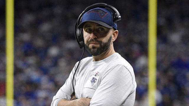 INDIANAPOLIS, IN - DECEMBER 18: New England Patriots receivers coach Mick Lombardi looks on during the NFL football game between the New England Patriots and the Indianapolis Colts on December 18, 2021, at Lucas Oil Stadium in Indianapolis, Indiana.