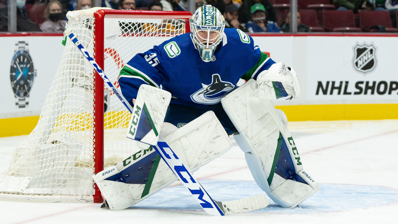 VANCOUVER, BC - FEBRUARY 09: Vancouver Canucks goaltender Thatcher Demko (35) watches the play during their NHL game against the New York Islanders at Rogers Arena on February 9, 2022 in Vancouver, British Columbia, Canada.