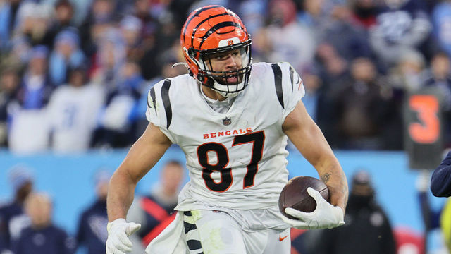 NASHVILLE, TENNESSEE - JANUARY 22: C.J. Uzomah #87 of the Cincinnati Bengals against the Tennessee Titans during the AFC Divisional Playoff at Nissan Stadium on January 22, 2022 in Nashville, Tennessee.