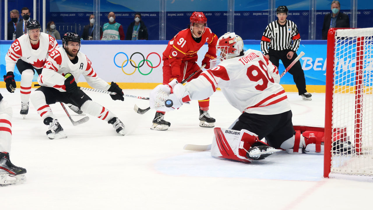 BEIJING, CHINA - FEBRUARY 13: Kent Johnson #98 of Team Canada makes a save during the Men's Ice Hockey Preliminary Round Group A match between Team China and Team Canada on Day 9 of the Beijing 2022 Winter Olympic Games at National Indoor Stadium on February 13, 2022 in Beijing, China.