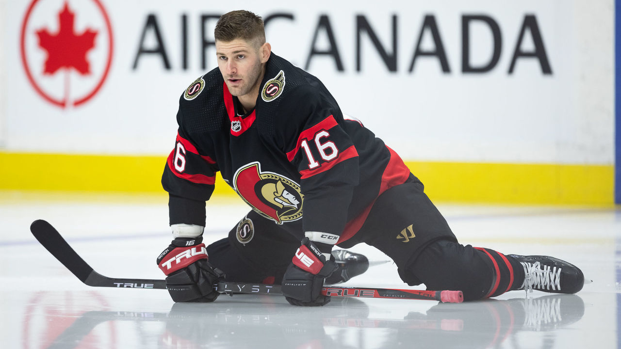 OTTAWA, ON - FEBRUARY 10: Austin Watson #16 of the Ottawa Senators stretches in warm-ups prior to the game against the Pittsburgh Penguins at the Canadian Tire Centre on February 10, 2022 in Ottawa, Ontario, Canada.