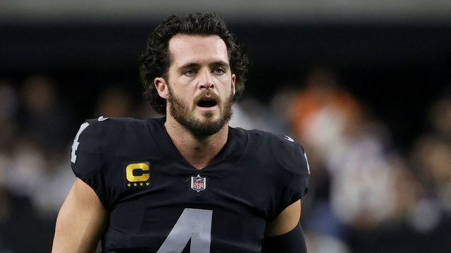 LAS VEGAS, NEVADA - JANUARY 09: Quarterback Derek Carr #4 of the Las Vegas Raiders warms up before a game against the Los Angeles Chargers at Allegiant Stadium on January 9, 2022 in Las Vegas, Nevada. The Raiders defeated the Chargers 35-32 in overtime.