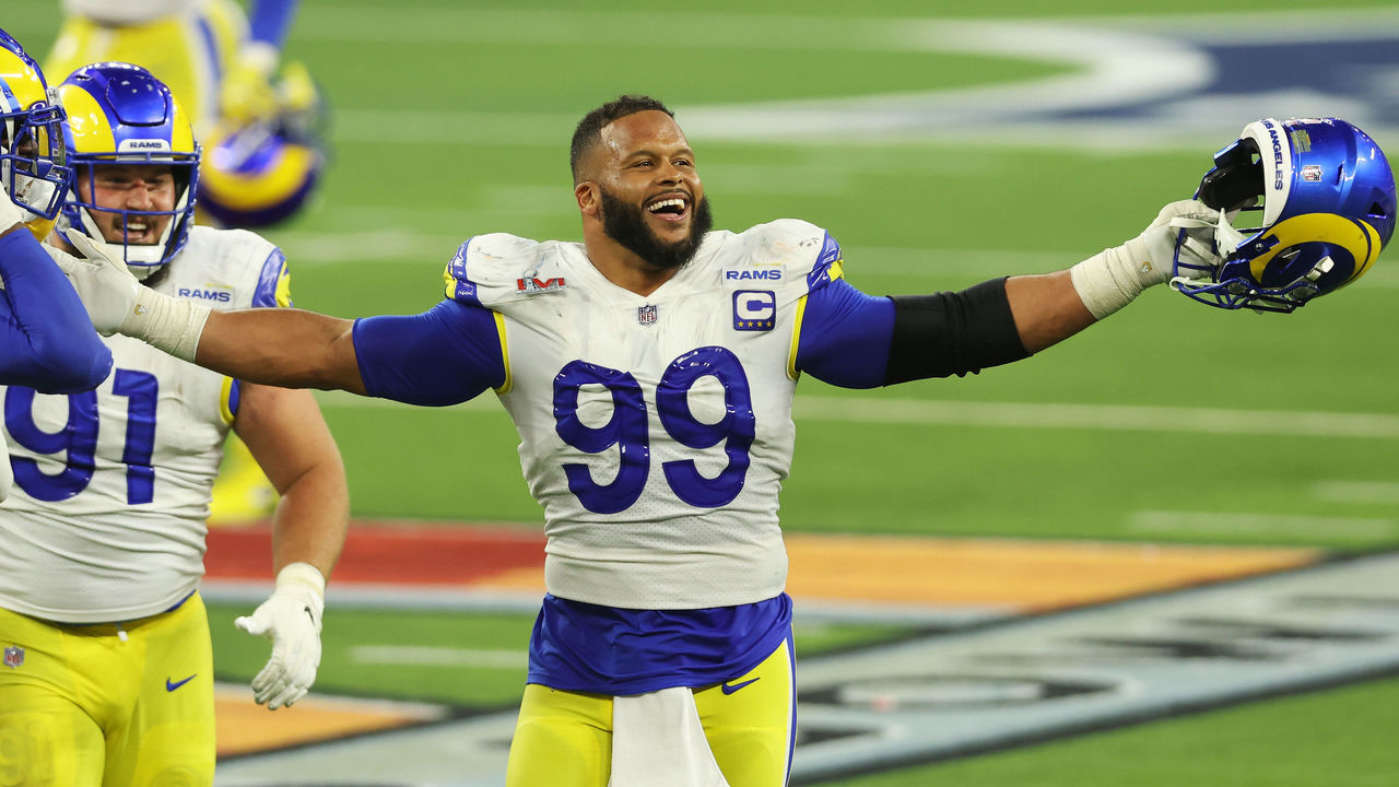 INGLEWOOD, CALIFORNIA - FEBRUARY 13: Aaron Donald #99 of the Los Angeles Rams reacts following a fourth down stop during the fourth quarter of Super Bowl LVI against the Cincinnati Bengals at SoFi Stadium on February 13, 2022 in Inglewood, California.