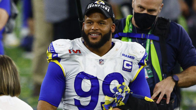 INGLEWOOD, CALIFORNIA - FEBRUARY 13: Aaron Donald #99 of the Los Angeles Rams celebrates after defeating the Cincinnati Bengals during Super Bowl LVI at SoFi Stadium on February 13, 2022 in Inglewood, California. The Los Angeles Rams defeated the Cincinnati Bengals 23-20.