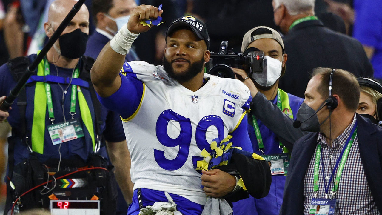 INGLEWOOD, CALIFORNIA - FEBRUARY 13: Aaron Donald #99 of the Los Angeles Rams celebrates after defeating the Cincinnati Bengals during Super Bowl LVI at SoFi Stadium on February 13, 2022 in Inglewood, California. The Los Angeles Rams defeated the Cincinnati Bengals 23-20.
