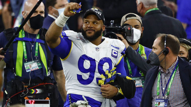 INGLEWOOD, CALIFORNIA - FEBRUARY 13: Aaron Donald #99 of the Los Angeles Rams celebrates after defeating the Cincinnati Bengals during Super Bowl LVI at SoFi Stadium on February 13, 2022 in Inglewood, California. The Los Angeles Rams defeated the Cincinnati Bengals 23-20.