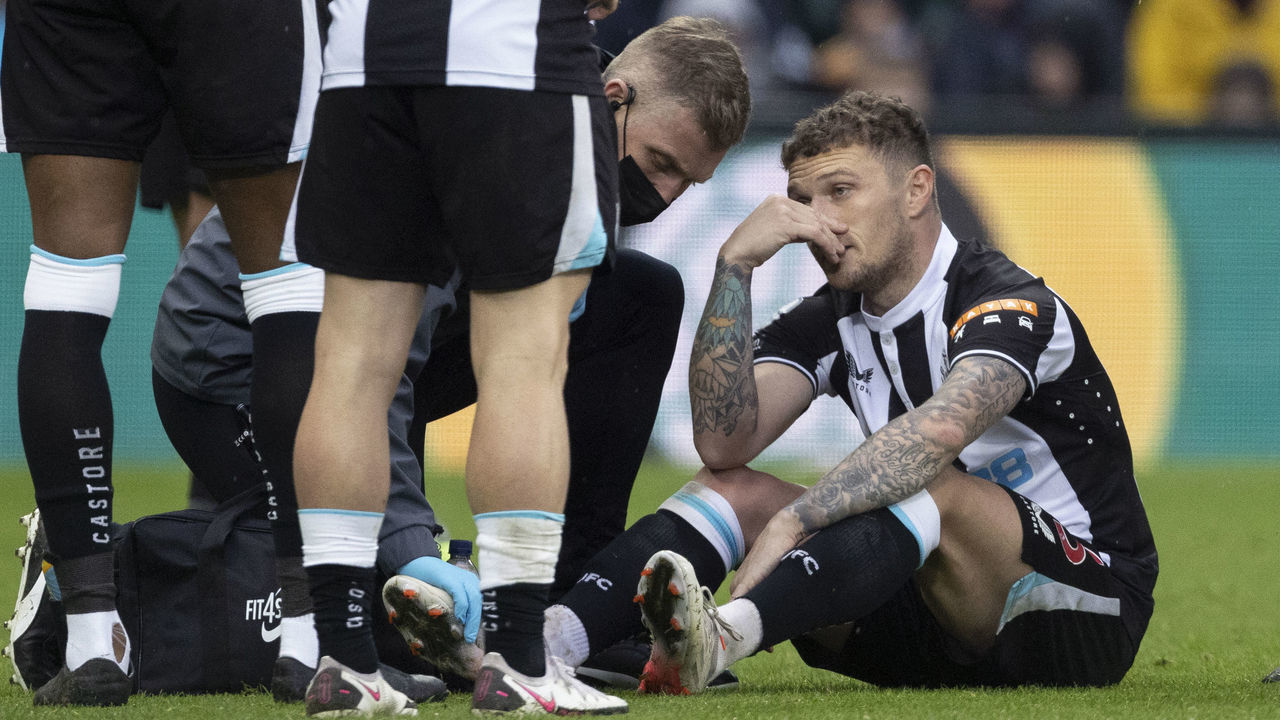 NEWCASTLE UPON TYNE, ENGLAND - FEBRUARY 13: Kieran Trippier of Newcastle United is injured and later diagnosed with a broken foot during the Premier League match between Newcastle United and Aston Villa at St. James Park on February 13, 2022 in Newcastle upon Tyne, United Kingdom.