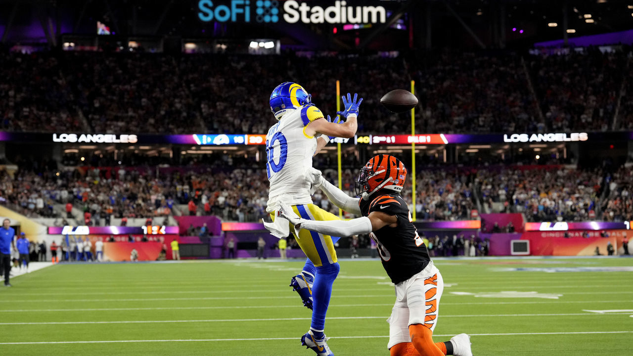 Inglewood, CA - February 13: Wide receiver Cooper Kupp, left, of the Los Angeles Rams catches a one-yard touchdown catch against cornerback Eli Apple (20) of the Cincinnati Bengals during the fourth quarter of the NFL Super Bowl LVI football game at SoFi Stadium in Inglewood, on Sunday, February 13, 2022.