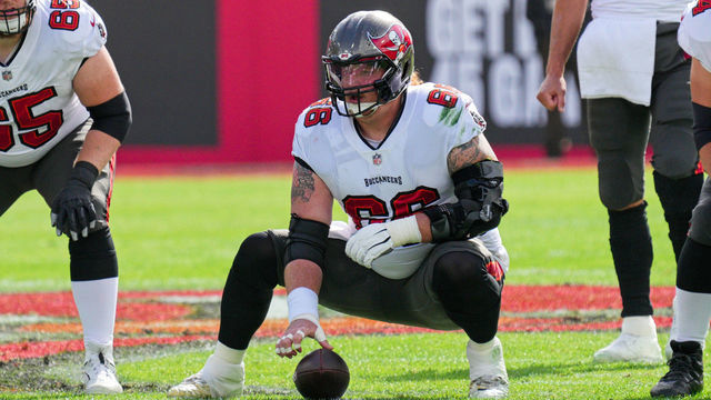 TAMPA, FL - JANUARY 16: Tampa Bay Buccaneers center Ryan Jensen (66) waits to snap the ball during the game between the Philadelphia Eagles and the Tampa Bay Buccaneers on January 16, 2022 at Raymond James Stadium in Tampa, FL.