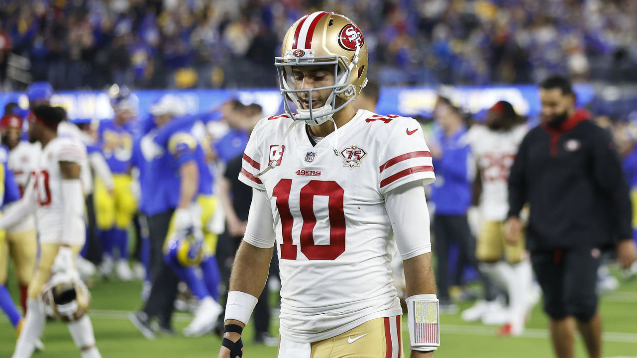 INGLEWOOD, CALIFORNIA - JANUARY 30: Jimmy Garoppolo #10 of the San Francisco 49ers walks off the field after being defeated by the Los Angeles Rams in the NFC Championship Game at SoFi Stadium on January 30, 2022 in Inglewood, California. The Rams defeated the 49ers 20-17.