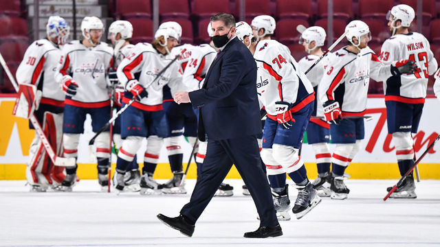 MONTREAL, QC - FEBRUARY 10: Head coach of the Washington Capitals Peter Laviolette walks across the ice as his team celebrates a victory against the Montreal Canadiens at Centre Bell on February 10, 2022 in Montreal, Canada. The Washington Capitals defeated the Montreal Canadiens 5-2.