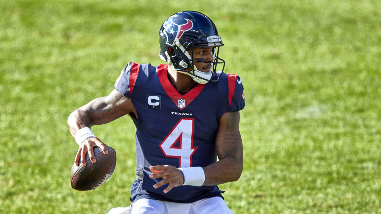 CHICAGO, IL - DECEMBER 13: Houston Texans quarterback Deshaun Watson (4) handles the football in action during a game between the Chicago Bears and the Houston Texans on December 13, 2020, at Soldier Field in Chicago, IL.