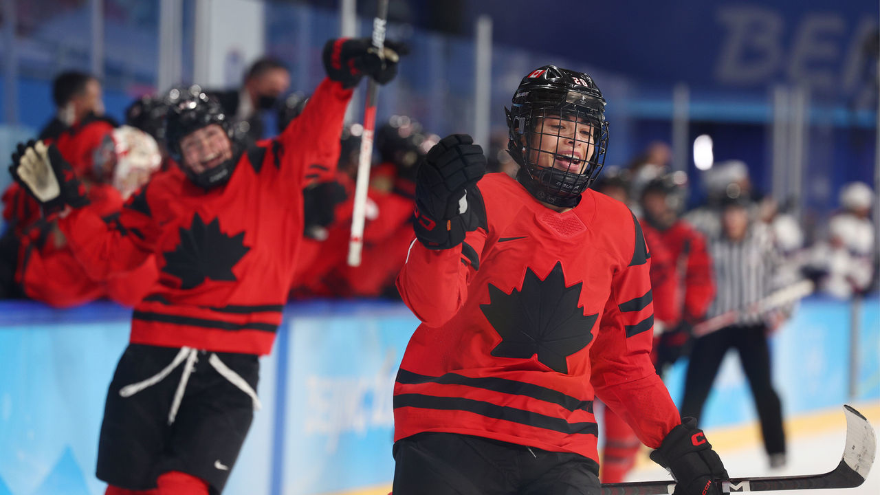 BEIJING, CHINA - FEBRUARY 17: Sarah Nurse #20 and Claire Thompson #42 of Team Canada skate away from the bench after celebrating with teammates on the bench after Nurse scored a goal in the first period during the Women's Ice Hockey Gold Medal match between Team Canada and Team United States on Day 13 of the Beijing 2022 Winter Olympic Games at Wukesong Sports Centre on February 17, 2022 in Beijing, China.
