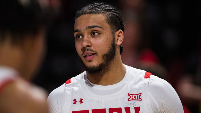 LUBBOCK, TEXAS - FEBRUARY 12: Forward Kevin Obanor #0 of the Texas Tech Red Raiders is introduced before the college basketball game against the TCU Horned Frogs at United Supermarkets Arena on February 12, 2022 in Lubbock, Texas.