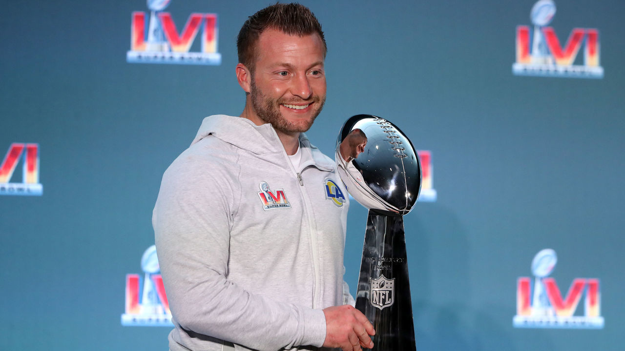 LOS ANGELES, CALIFORNIA - FEBRUARY 14: Head coach Sean McVay of the Los Angeles Rams poses with the Vince Lombardi Trophy during the Super Bowl LVI head coach and MVP press conference at Los Angeles Convention Center on February 14, 2022 in Los Angeles, California.