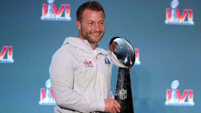 LOS ANGELES, CALIFORNIA - FEBRUARY 14: Head coach Sean McVay of the Los Angeles Rams poses with the Vince Lombardi Trophy during the Super Bowl LVI head coach and MVP press conference at Los Angeles Convention Center on February 14, 2022 in Los Angeles, California.