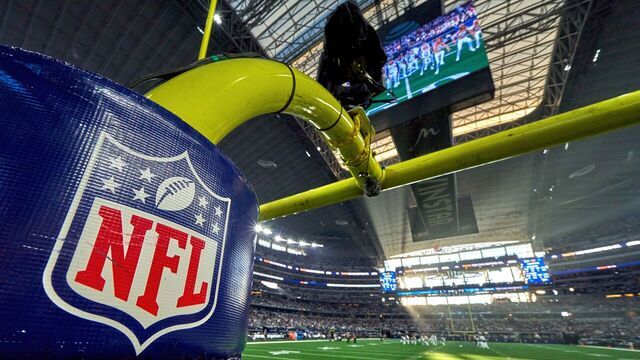 ARLINGTON, TX - JANUARY 16: A detail view of the NFL Logo crest is seen on a goal post pad during the NFC Wild Card game between the San Francisco 49ers and the Dallas Cowboys on January 16, 2022 at AT&T Stadium in Arlington, TX.