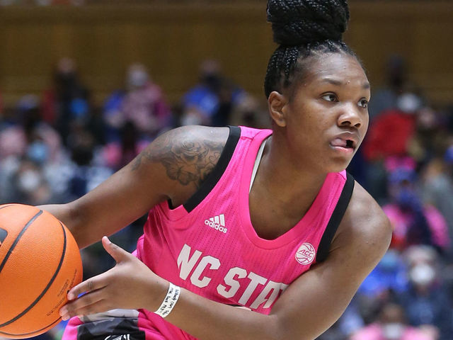 DURHAM, NC - FEBRUARY 13: NC State Wolfpack guard Diamond Johnson (0) passes the ball inside during the womens college basketball game between NC State and Duke on February 13, 2022 at Cameron Indoor Stadium.