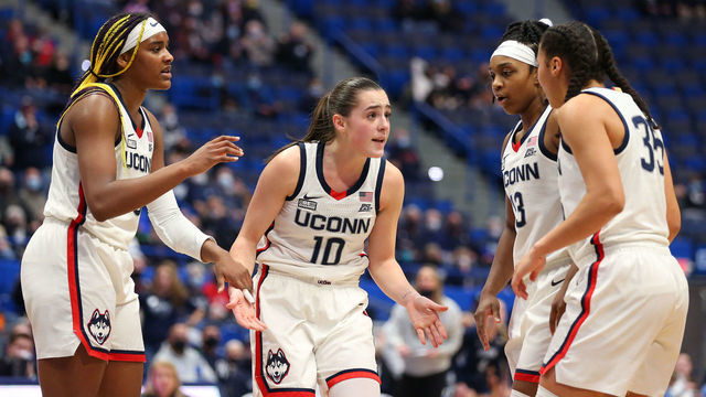 HARTFORD, CT - FEBRUARY 09: UConn Huskies forward Aaliyah Edwards (3), UConn Huskies guard Nika Muhl (10), UConn Huskies guard Christyn Williams (13) and UConn Huskies guard Azzi Fudd (35) huddle during a college basketball game between Villanova Wildcats and UConn Huskies on February 9, 2022, at the XL Center in Hartford, CT.