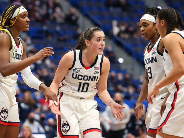 HARTFORD, CT - FEBRUARY 09: UConn Huskies forward Aaliyah Edwards (3), UConn Huskies guard Nika Muhl (10), UConn Huskies guard Christyn Williams (13) and UConn Huskies guard Azzi Fudd (35) huddle during a college basketball game between Villanova Wildcats and UConn Huskies on February 9, 2022, at the XL Center in Hartford, CT.