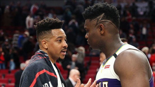 PORTLAND, OREGON - FEBRUARY 21: CJ McCollum #3 of the Portland Trail Blazers and Zion Williamson #1 of the New Orleans Pelicans shake hands after the New Orleans Pelicans defeated the Portland Trail Blazers 128-115 during their game at Moda Center on February 21, 2020 in Portland, Oregon.