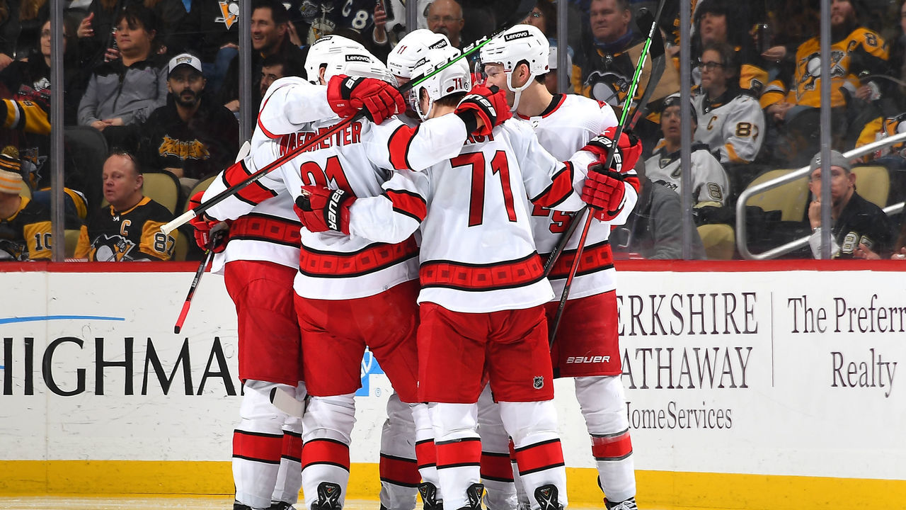 PITTSBURGH, PA - FEBRUARY 20: Jesper Fast #71 of the Carolina Hurricanes celebrates his goal with teammates during the third period against the Pittsburgh Penguins at PPG PAINTS Arena on February 20, 2022 in Pittsburgh, Pennsylvania.