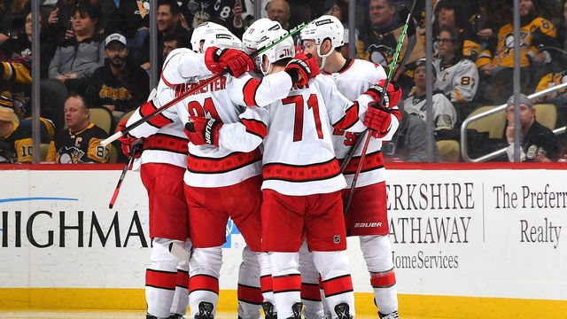 PITTSBURGH, PA - FEBRUARY 20: Jesper Fast #71 of the Carolina Hurricanes celebrates his goal with teammates during the third period against the Pittsburgh Penguins at PPG PAINTS Arena on February 20, 2022 in Pittsburgh, Pennsylvania.