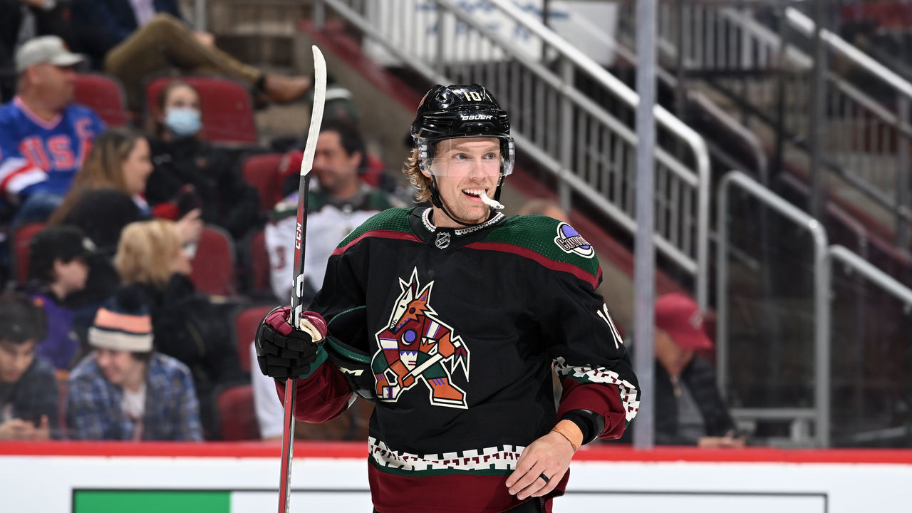 GLENDALE, ARIZONA - JANUARY 12: Ryan Dzingel #10 of the Arizona Coyotes smiles after scoring his second goal against the Toronto Maple Leafs during the third period at Gila River Arena on January 12, 2022 in Glendale, Arizona. The Coyotes beat the Maple Leafs 2-1.