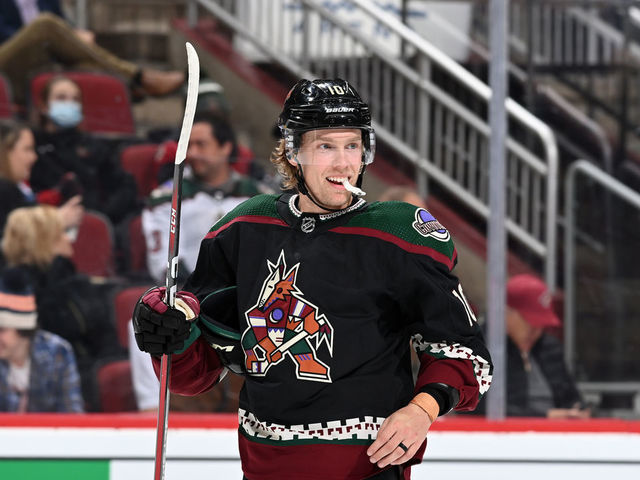 GLENDALE, ARIZONA - JANUARY 12: Ryan Dzingel #10 of the Arizona Coyotes smiles after scoring his second goal against the Toronto Maple Leafs during the third period at Gila River Arena on January 12, 2022 in Glendale, Arizona. The Coyotes beat the Maple Leafs 2-1.