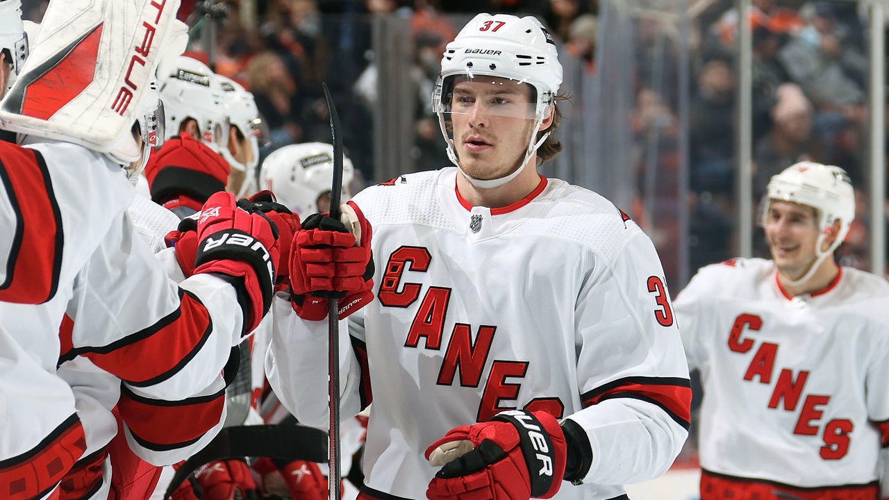 PHILADELPHIA, PA - NOVEMBER 26: Andrei Svechnikov #37 of the Carolina Hurricanes celebrates his third period goal against the Philadelphia Flyers with his teammates on the bench at the Wells Fargo Center on November 26, 2021 in Philadelphia, Pennsylvania.