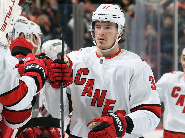 PHILADELPHIA, PA - NOVEMBER 26: Andrei Svechnikov #37 of the Carolina Hurricanes celebrates his third period goal against the Philadelphia Flyers with his teammates on the bench at the Wells Fargo Center on November 26, 2021 in Philadelphia, Pennsylvania.