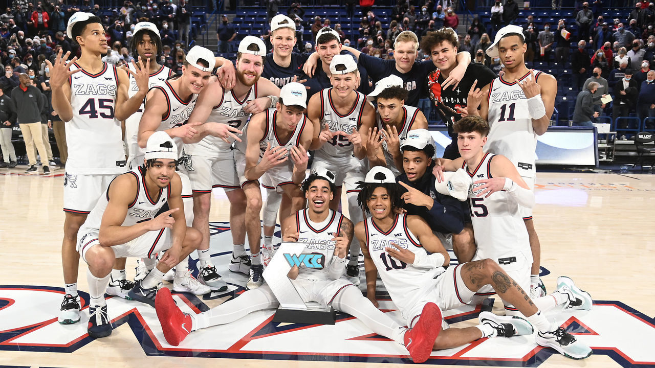SPOKANE, WA - FEBRUARY 19: The Gonzaga Bulldogs pose with the WCC Conference Championship trophy after beating Santa Clara in a game at the McCarthey Athletic Center on February 19, 2022 in Spokane, Washington.