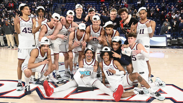 SPOKANE, WA - FEBRUARY 19: The Gonzaga Bulldogs pose with the WCC Conference Championship trophy after beating Santa Clara in a game at the McCarthey Athletic Center on February 19, 2022 in Spokane, Washington.