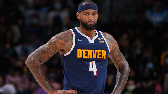 DENVER, CO - JANUARY 23: DeMarcus Cousins #4 of the Denver Nuggets looks on during the game against the Detroit Pistons on January 23, 2022 at the Ball Arena in Denver, Colorado. NOTE TO USER: User expressly acknowledges and agrees that, by downloading and/or using this Photograph, user is consenting to the terms and conditions of the Getty Images License Agreement. Mandatory Copyright Notice: Copyright 2022 NBAE